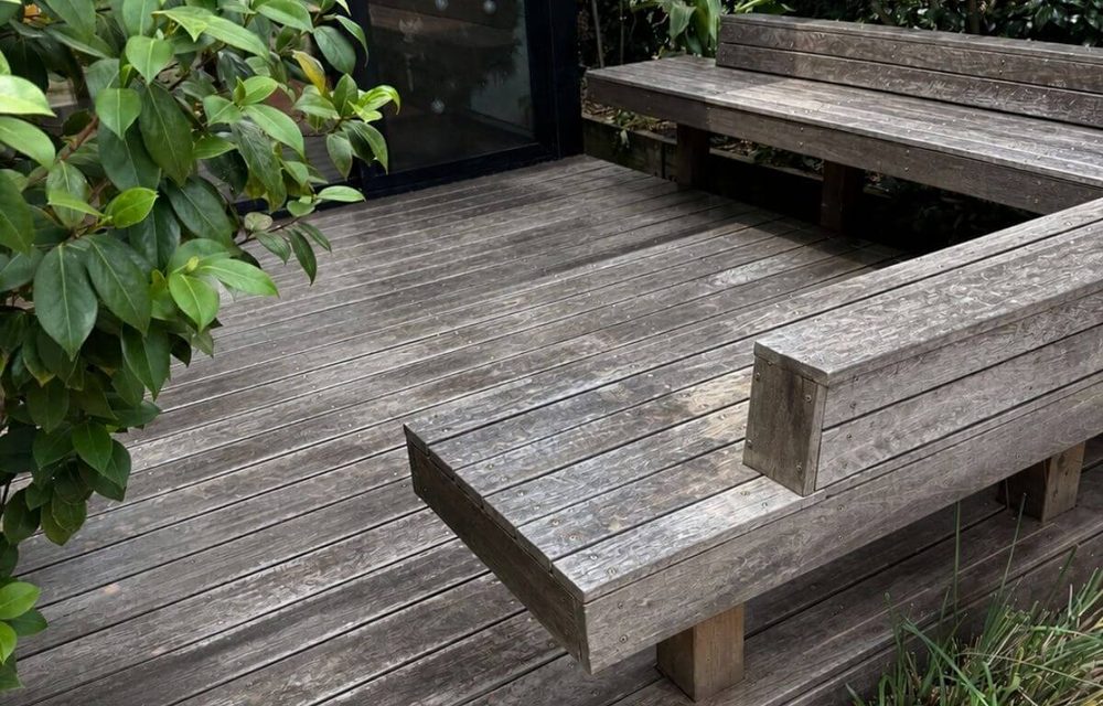 Before — weathered timber deck prior to deck maintenance