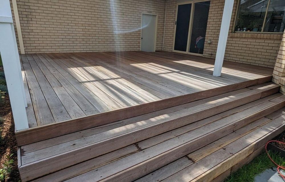 Before — weathered timber deck prior to deck restoration